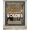Sticker Soldes Légitime Dépense pour décorer vos vitres pour les soldes